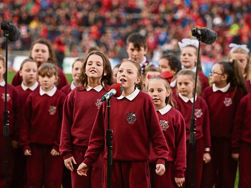 Students from Corpus Christi School perform during half-time in the recent Munster Scarlets game at Thomond Park