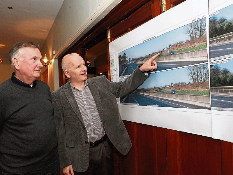 Cllr Joe Pond and Barry O’Sullivan of Johnson and Johnson at the public meeting in Monaleen GAA Club about the proposed second wind turbine