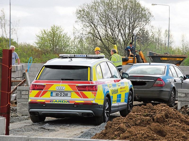 Members of the armed Regional Support Unit accompanied officials from Limerick City and County Council to the construction site at Ballycummin