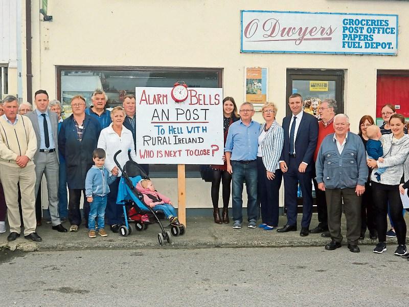 Deputy Niall Collins and protesters at proposed closure of Old Pallas post office last year - which was later reversed Picture: Brendan Gleeson