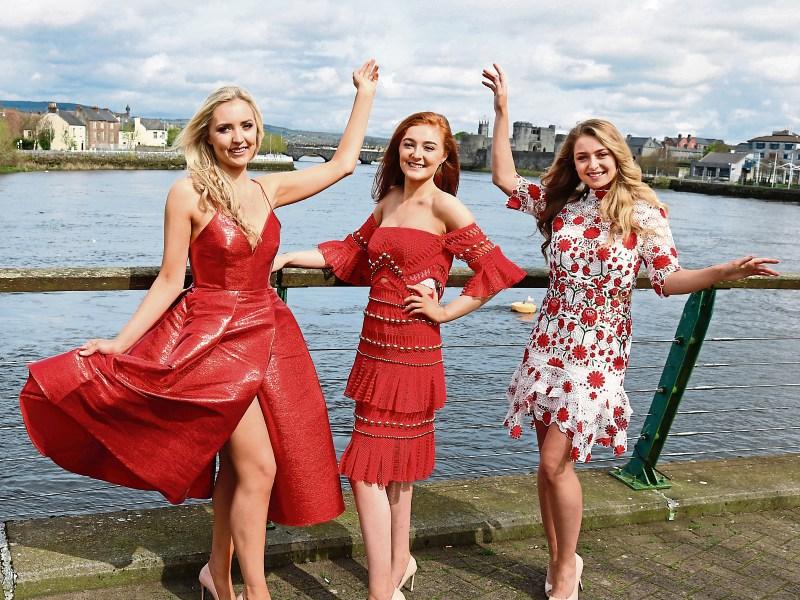 Limerick ladies in red: Sarah Morrissey, Caoimhe Hickey and Emma Doran get ready for Fashion Friday at Arthurs Quay