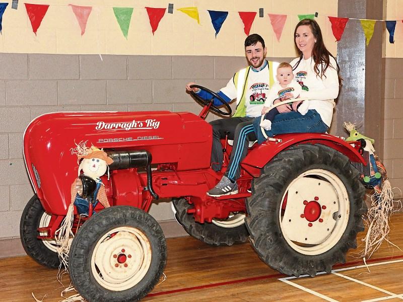 Donnacha O'Brien and Patrice Clarke with their baby F&iacute;adh at Darragh&rsquo;s Vintage Tractor Run and Family Fun Day in Doon Picture: Dave Gaynor