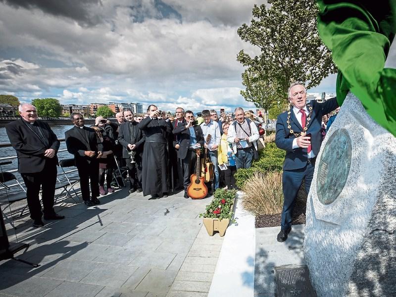 Mayor of Limerick City and County Stephen Keary unveils the €10,000 memorial to Pope St John Paul II on Bishop’s Quay on Monday Picture: Keith Wiseman