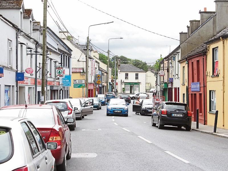 The Spar on the left hand side is next to the former Ulster Bank building