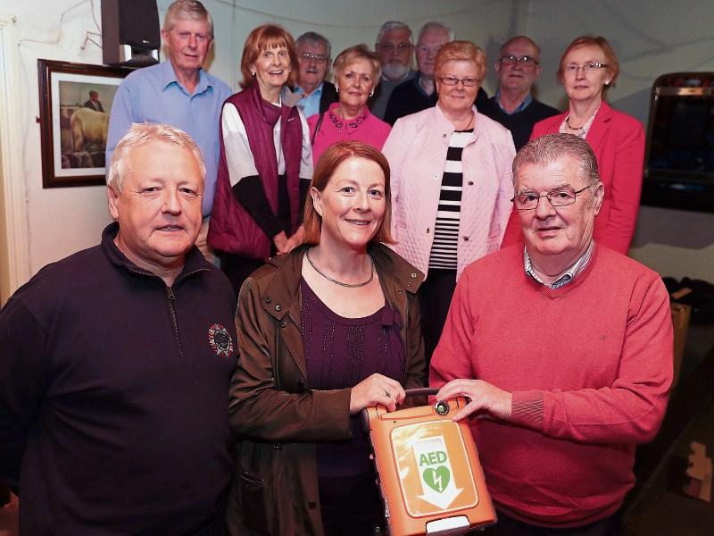 John Mulready, Cappamore Fire Brigade, Marianne Fitzgibbon, sponsor of one of the defibrillators, Tony Greene, chairman of the Pallasgreen Community Defibrillator Committee with fellow members