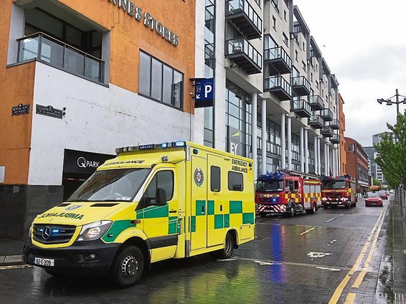 Emergency services at scene of car collision in Limerick city