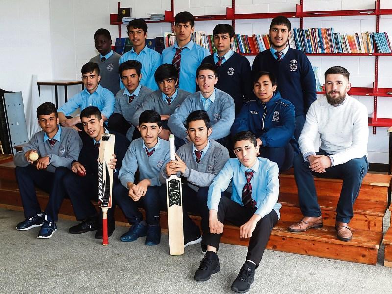 The CBS Sexton Street Cricket team with teacher LLoyd Woulfe Picture: Michael Cowhey