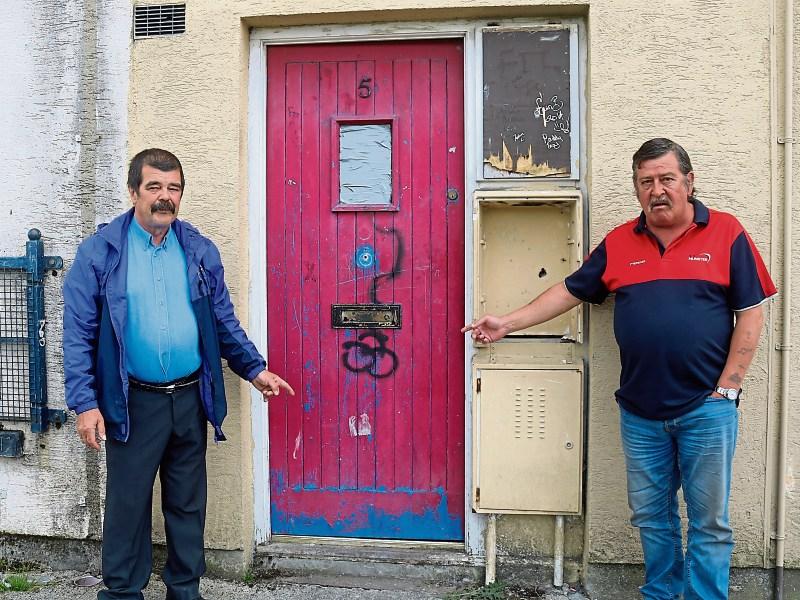 Patrick Joseph Molloy, pictured here with community activist Noel ‘Buster' Hannan, outside his home in the Hyde Road Picture: Michael Cowhey
