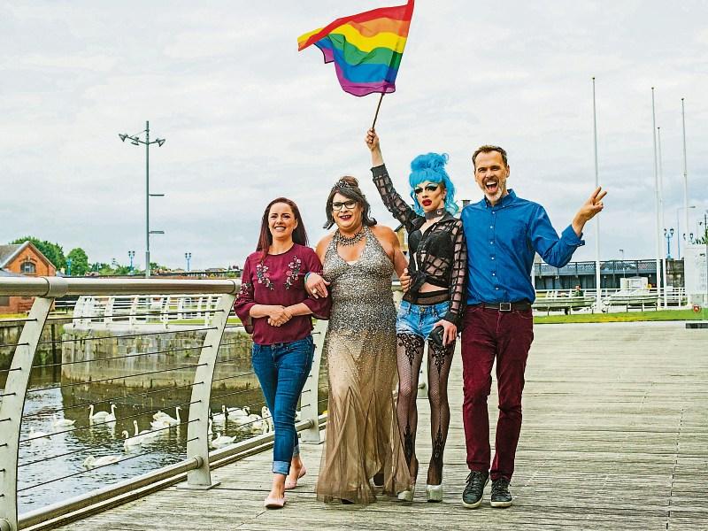 Flying the Pride Flag are Lisa Daly, Limerick Pride 2018 chairperson, Elsie Cox, Karma Monet and Limerick Pride 2018 Grand Marshall Richard Lynch Picture: Cian Reinhardt/ilovelimerick