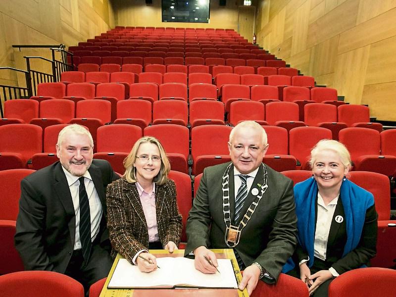 Brendan Lane, then Chair of the Lime Tree board, Louise Donlon, Lime Tree manager, then Metro Mayor Cllr Jerry O’Dea and Sheila Deegan, Arts Officer, signing the agreement in 2015