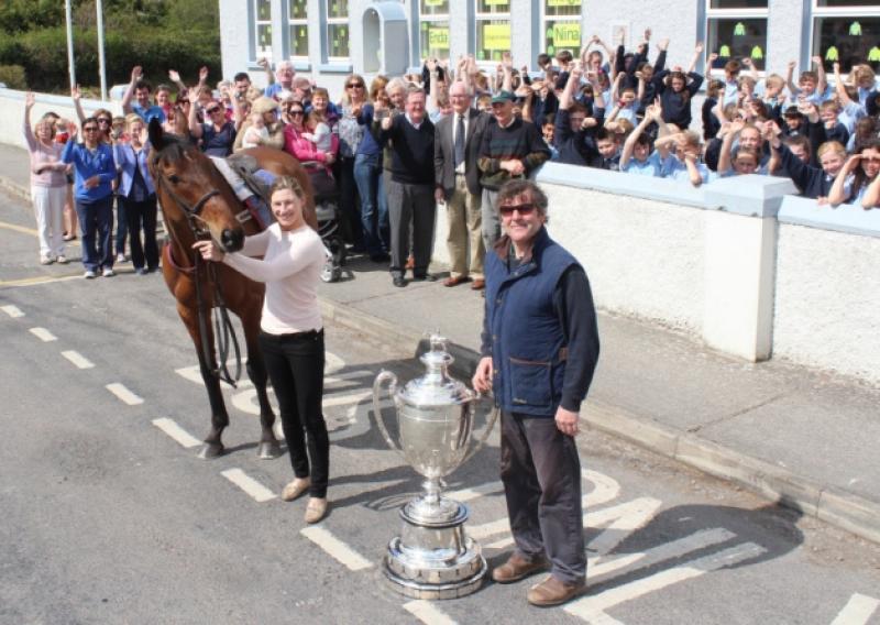 There was a silent cheer by Athlacca National School pupils for the visit of the Enda Bolger trained On The Fringe, being held by Nina Carberry. Picture: Michael Cowhey