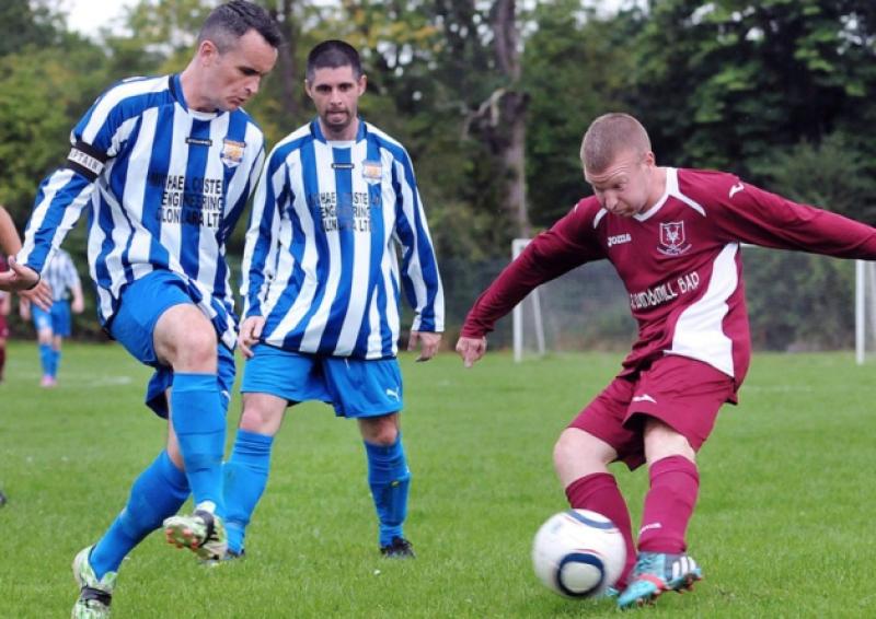 Barry Dillon, Carew Park, in action against Eoghan Ryan, Summerville Rovers in their midweek LDL Premier League game. Carew Park won the game 2-1.