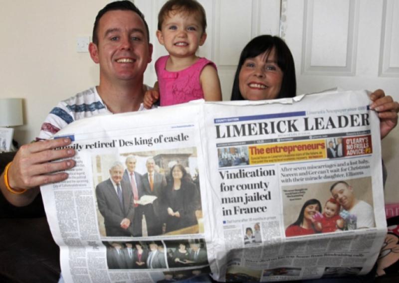 Ger, Noreen and Ellianna Thompson with their front page story on the Limerick Leader from almost a year ago