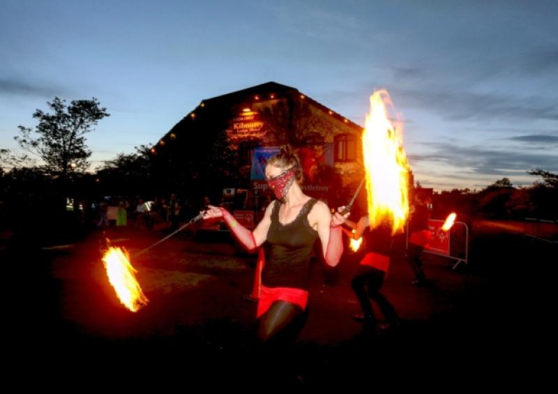 Fire breathers, dancers and drummers entertain the crowds at the last week's Fire Walk at the Kilmurry Lodge Hotel in aid of the Special Olympics Ireland Games to be held in UL Sport Arena, Limerick from June 12 to 15. Some 200 people participated in the fire-walk which raised  over �10,000 for the games support. Picture: Keith Wiseman