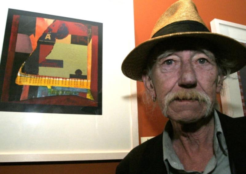 John Liddy pays tribute to the late EJ Peters, artist, seen here showing one of his paintings at the Chopin Exhibition presented by the Irish Polish Business Association at the Strand Hotel. Picture Brendan Gleeson