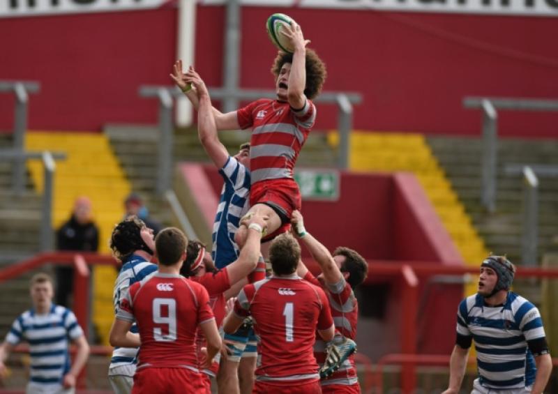 Glenstal Abbey's Neilus Mulvihill wins possession in a lineout ahead of Sean O'Connor, of Rockwell College, in their SEAT Munster Schools Senior Cup semi-final at Thomond Park this Wednesday