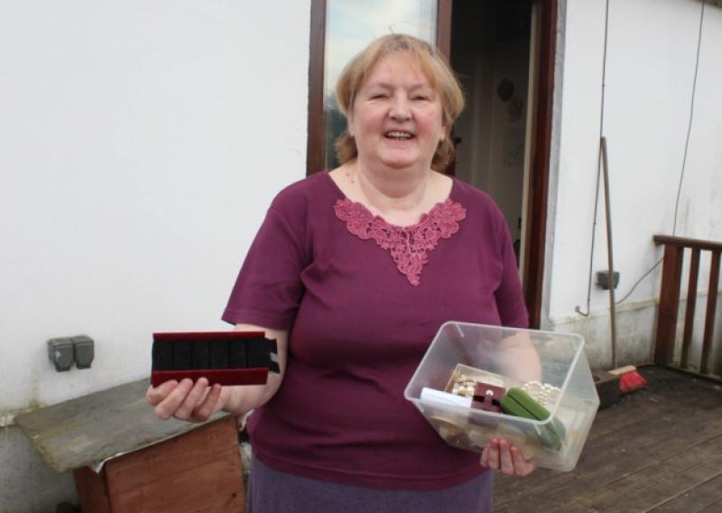 Mary Cullen shows her empty ring boxes after �10,000 worth of jewellery was stolen from her home last ChristmasPicture: Michael Cowhey
