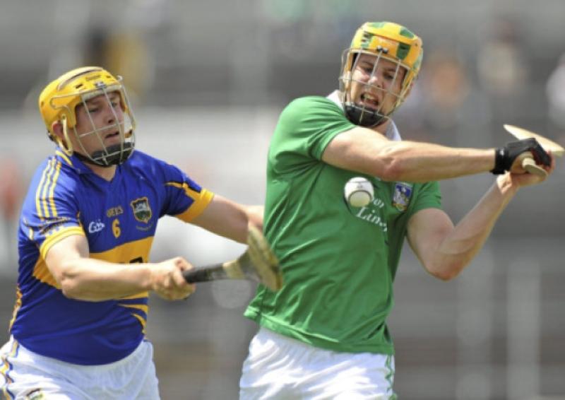 Limerick's Dan Morrissey in action against David Young of Tipperary during the Munster Intermediate Hurling Championship Semi-Final
