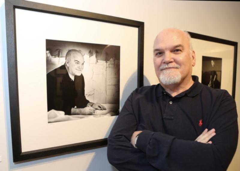 Designer John McNamara with his portrait in photographer Cormac Byrne's exhibition in the Hunt Museum last year. Picture: Liam Burke/Press 22