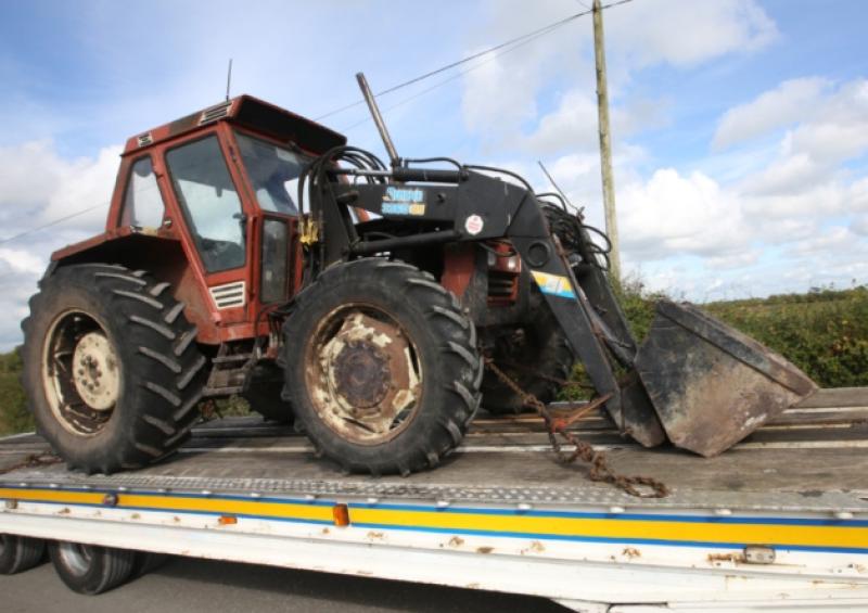 The tractor is removed from the scene of the tragedy in Newtownshandrum. Paula Dinsberga, pictured below