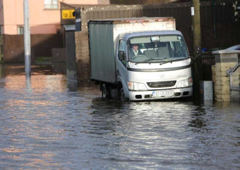 Breadman Philip Treacy leaving St Mary's Park where the river Shannon burst its banks this weekend. Picture: Liam Burke/Press 22