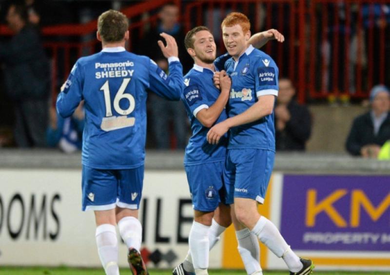 Limerick's Rory Gaffney, right, celebrates with team-mates Jason Hughes, centre, and Barry Sheedy after scoring his side's first goal against Shelbourne on Wednesday night