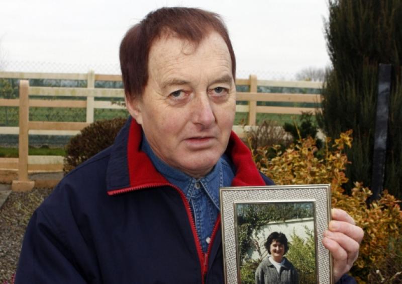 Eamon O'Keeffe with a picture of his late wife Marie, who died just six days after their hospital wedding in 1999, and below, the death certificate which greatly upset him. Picture:  Dave Gayor