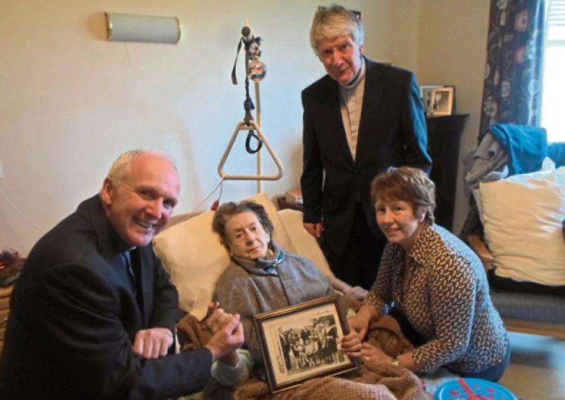 Helen Mullane (nee Sheehan), with her daughter Joan Twohill, Bishop Leahy and Fr McAuliffe, at Beech Lodge Care Facility, Bruree