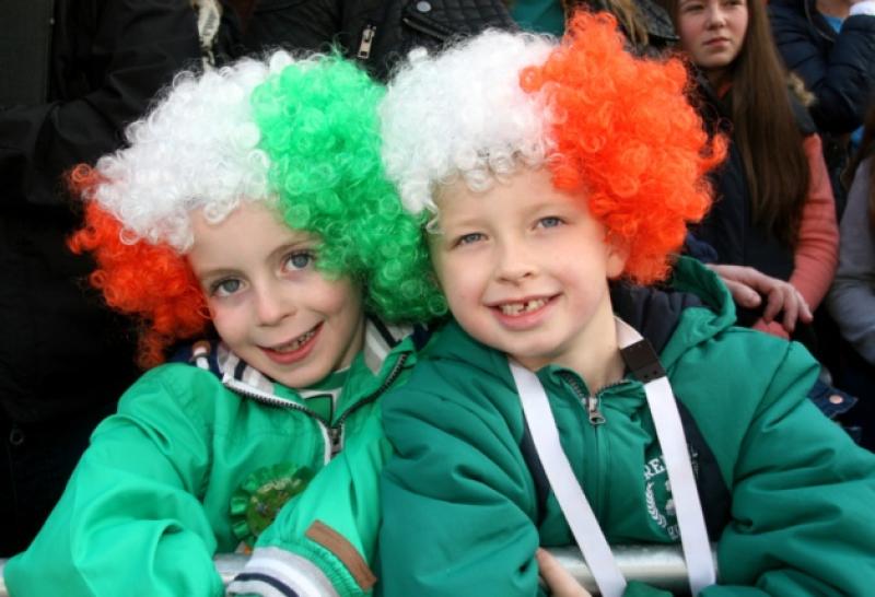 Alex Ahern and Adam McMahon from Singland Road enjoying the St Patrick's Day parade in Limerick.   Picture: Adrian Butler