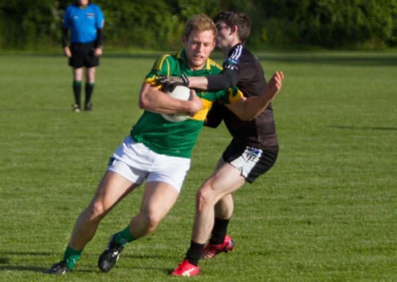 Darragh Treacy, St. Kierans, takes on Mike O'Keefe, Newcastle West during their Limerick SFC tie