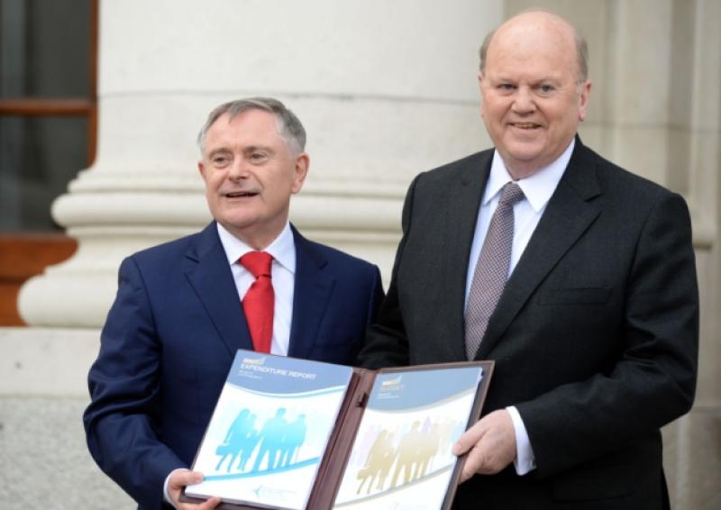 Finance Minister Michael Noonan and the Minister for Public Expenditure and Reform Brendan Howlin, presenting Budget 2016, at Government Buildings.  Photograph courtesy of the Irish Times