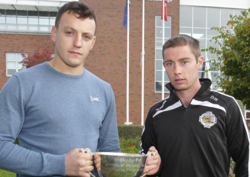 Bruree's Shane Mullane and Knockainey captain, Dermot Walsh pictured ahead of the LImerick Premier IHC final with the Michael Fox Cup