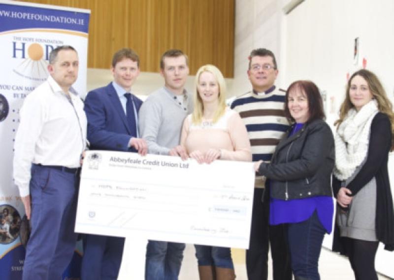 Members of the Remembering Zo� commemorative weekend who recently presented the Hope Foundation with a cheque. Pictured are, left to right, John Collins, Michael Lane, Eddie Murphy, Alisha Scannell, Fr Joseph Foley, Francis Hayes and Charlotte Nagle