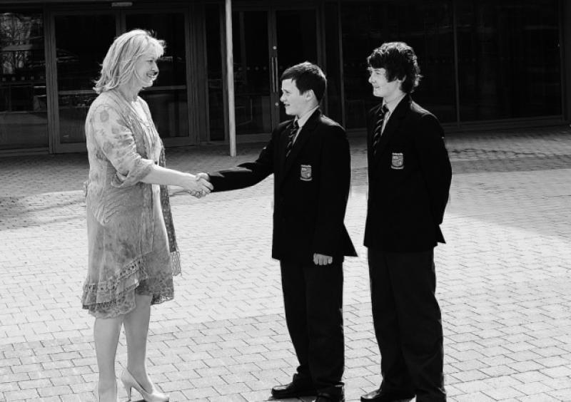 Mrs Brid de Br�n, Principal, welcomes Tom Nedlec and Ruben McCarthy to Ardscoil on the 50th Anniversary of the school's foundation in September