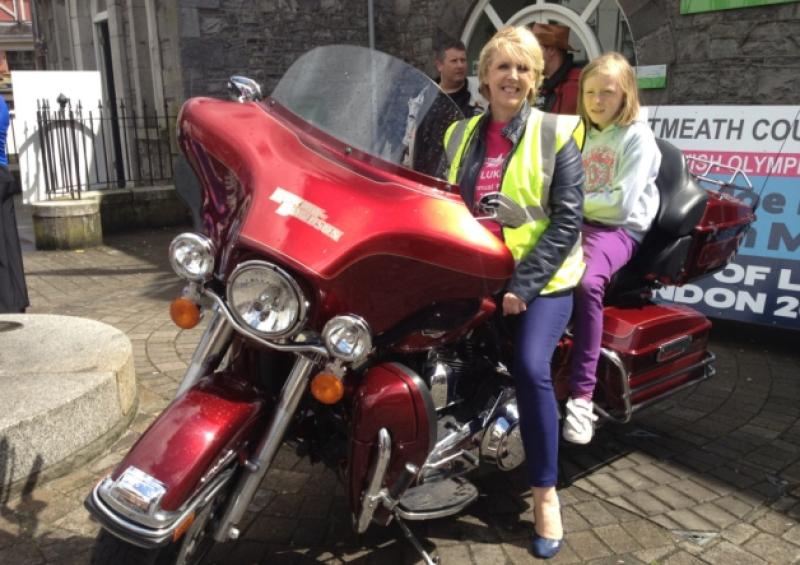 Loretto Farrell and her daughter on the motorcyle charity run