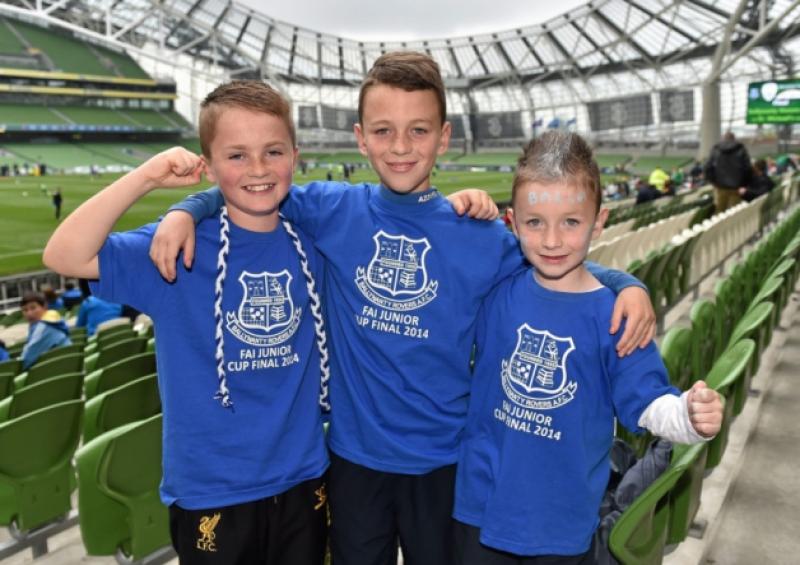 Ballynanty supporters Darragh Shine, 11, Rian O'Connell, 11, and Cillian O'Connell, 6 at the FAI Junior Cup final. Picture: Barry Cregg / SPORTSFILE