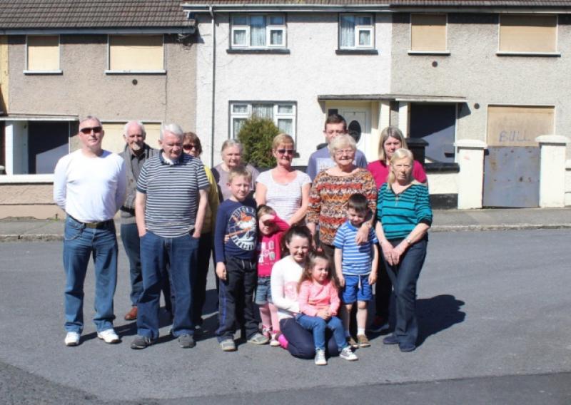 Residents of Markievicz Drive in Southill, pictured outside some of the houses earmarked for demolition under Regeneration