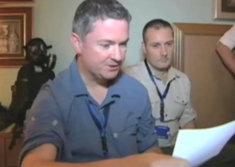 Kieran Carey from Janesboro, part of the OPCW team, reading a letter of congratulations from Director General Ahmet Uzumcu for wining the Nobel Prize for their work toward eliminating chemical weapons in Syria