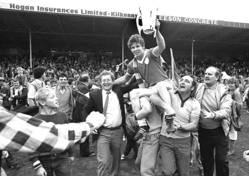 Limerick captain, Anthony O'Riordan celebrating with fans after the final whistle in Thurles in 1984