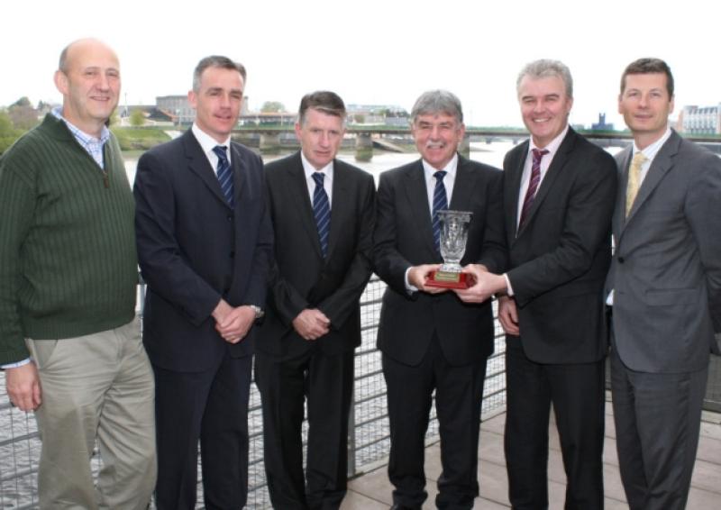 Alan English, Limerick Leader editor, presenting the Limerick Person of the Month award to the Ballyneety Golf Club committee represented by Liam Lawlor, Minie O'Brien and Donal McSweeney. Also pictured are Ray Ryan, of media agency Southern and Ivan Tuohy, Clarion Hotel. Picture: Adrian Butler