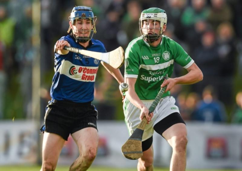 Conor Barry, Kilmallock, in action against Daniel Roche, Sarsfields during Sunday's Munster club SHC semi-final