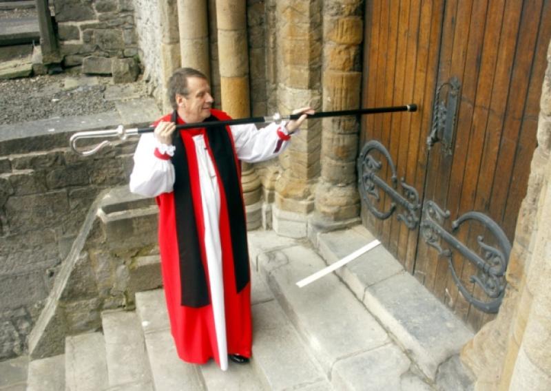Knocking on heaven's door: The newly installed Bishop of Limerick and Killaloe Dr Kenneth Kearon knocks on the door of St Mary's Cathedral with his staff ahead of his enthronement last weekend. Picture: Dave Gaynor