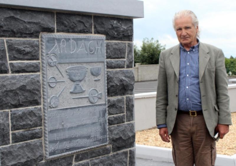 Sculptor  Jack Mc Kenna pictured next to the new monument at Ardagh Church [Picture: Michael Cowhey].