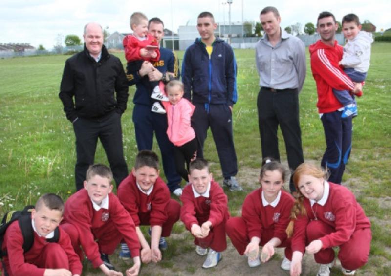 Goal mouth: at the Moyross United soccer pitch were Johnny Corbett, Ger Cronin, Shane O'Connell, Ryan Corbett, Edward O'Gorman, Jordan Franklin, Dylan Franklin, Dion Leo, Sophie Quinn , Victoria Keogh O'Connor, Kerry Corbett, Parish Priest Fr Tony ORiordan, Tiernan O'Neill, principal, Corpus Christi, and Shay Glasheen, Moyross. Picture: Dermot Lynch