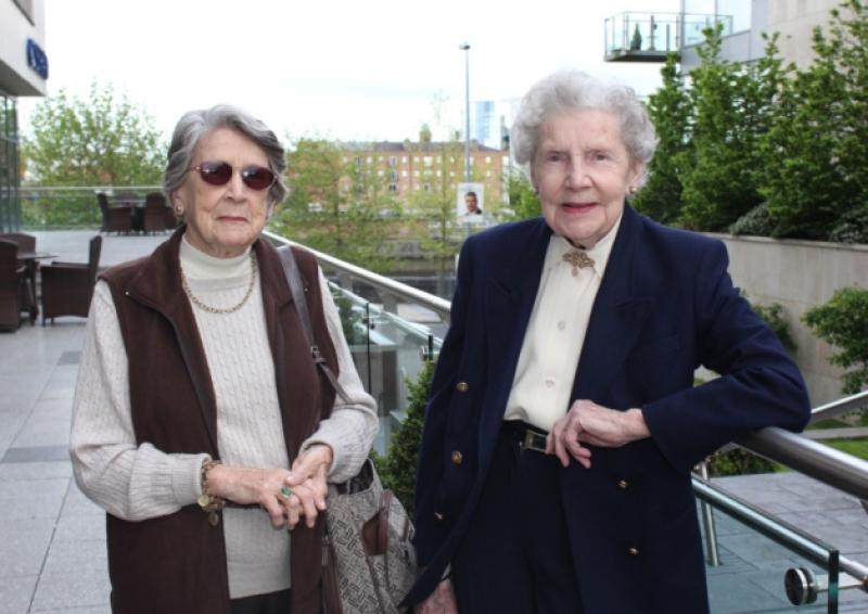 Clare OBrien Dodd and Kay Morrhall, nieces of the great Limerick writer Kate O'Brien, during their stay at the Strand Hotel - and below, a photo  taken at Strand House, Limerick, on December 6, 1921, the morning after the Treaty was signed and includes an inscrutable Eamon De Valera with Dick Mulcahy, chief of staff of the IRA, his aide-de-camp Michael Rynne, Cathal Brugha and Stephen Snr and Mary O'Mara, then owners of Strand House, now the site of the Strand Hotel