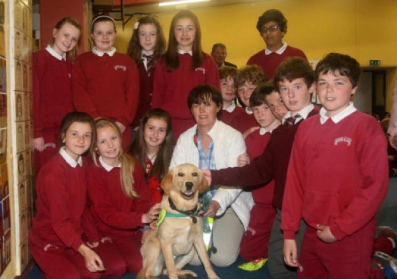 Students at Monaleen National School with Hanna the trainee guide dog and her handler Joan Heffernan. Picture: Mike Cowhey