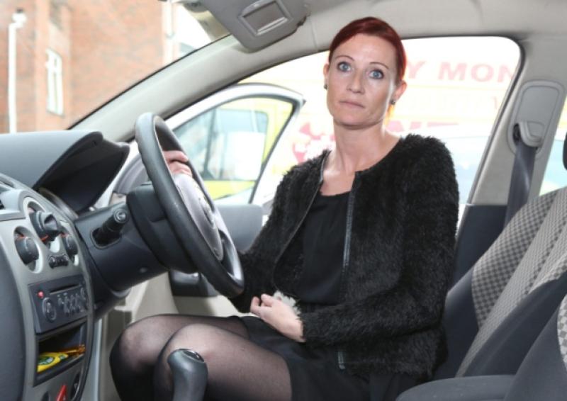 Buyer wanted: Lorna O'Connor, from Corbally, in her Renault Megane, which she describes as the worst car in the world. Picture: Liam Burke/Press 22