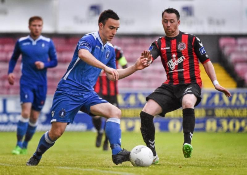 Limerick FC's Shane Tracy shows a neat touch against Paddy Kavanagh, of Bohemians, in their SSE Airtricity League Premier Division tie at Dalymount Park on Friday night