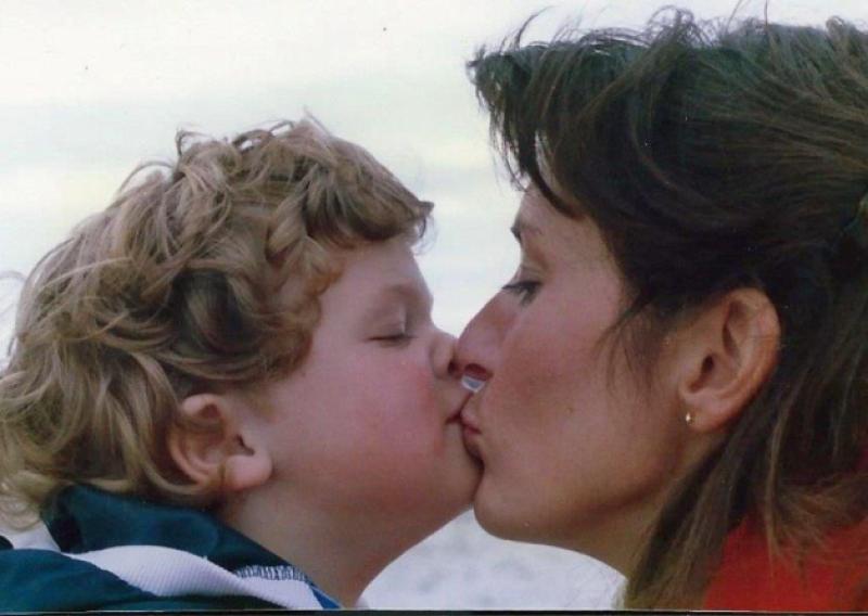 The late Christopher 'Tiffer' Morris giving his mum Shanny a kiss as a child and below. He died in Argentina in May