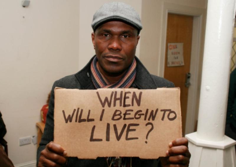 M'Broh Jacques Koffi, a tailor from the Ivory Coast, at the protest in Limerick: 'We can't live like this. This is mental torture. How much longer do we have to wait?'